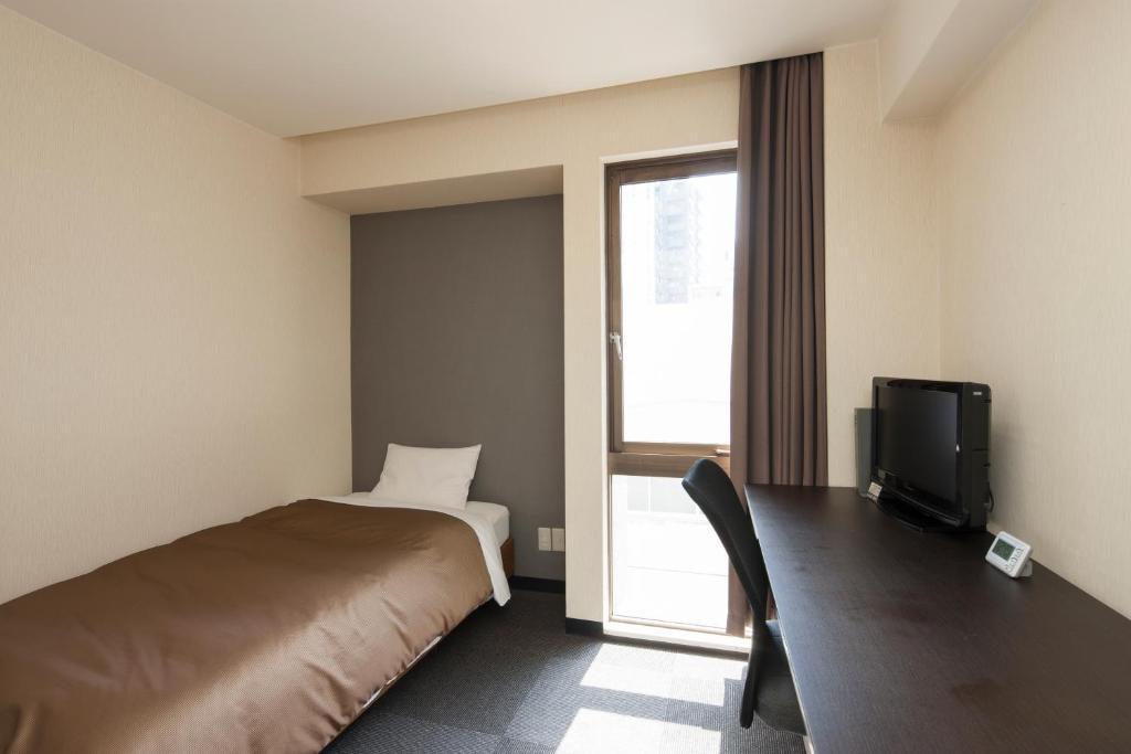 Hotel Plaza Inn Tokushima Kamer foto