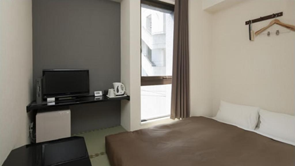 Hotel Plaza Inn Tokushima Kamer foto