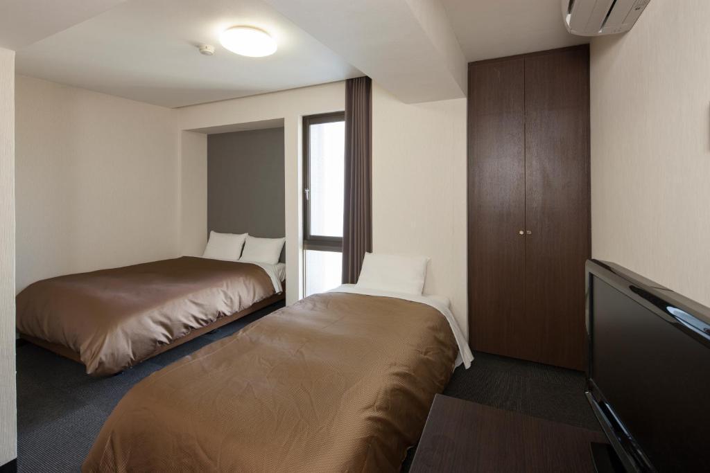 Hotel Plaza Inn Tokushima Buitenkant foto